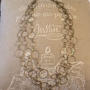 Trio strand of gold toned circle chain necklace